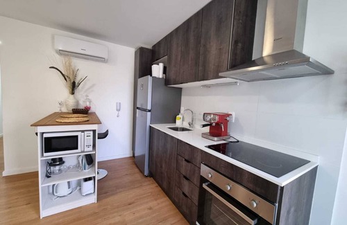Pocitos Apartment | A modern loft with a smart key system, located close to a Mall and beaches.