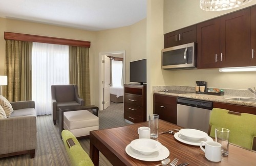 Feather Sound Hotel | A Place to Unwind, Unplug, and Recharge! Full Kitchen, Free Breakfast, Pool!