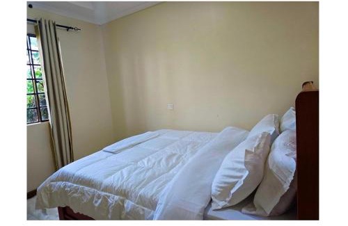 Arusha House | A private bedroom in a shared home in Arusha