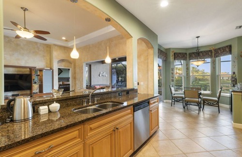 Nokomis House | A rare gem! Stunning water-view executive home w/heated-salt-water pool and spa