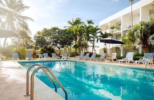 St. Lawrence Gap Apartment | A Short Drive Away from Welches Beach! 4 Pool View Rooms w/Patio! FREE Parking!