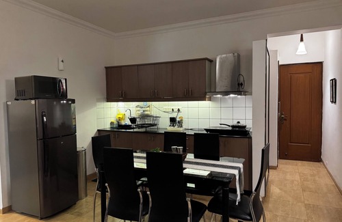 Arpora Apartment | A spacious 2BHK poolside apartment nestled in the foothills - 8min from beach.