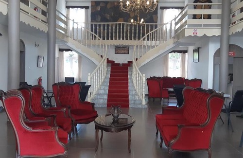 Pointe aux Canonniers Hotel | A Very Big Room for Two People in a Nice Palais