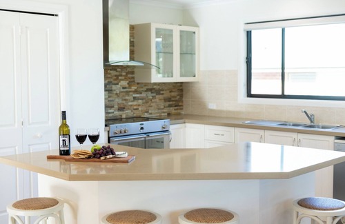 Vincentia Apartment | Above by Sanddancers - light, spacious apartment, short walk to beach