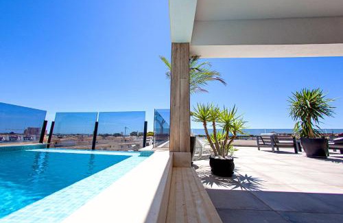 Santiago de la Ribera Apartment | ACK Living