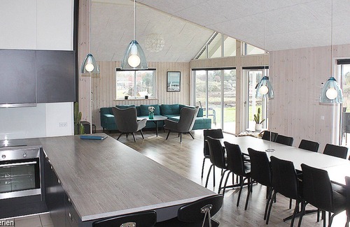 Vejby House | Activity house on a large lawn with pool and XL kitchen
