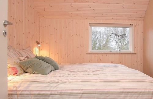 Toftum House | Activity house under thatch with pool, whirlpool, sauna and activity room