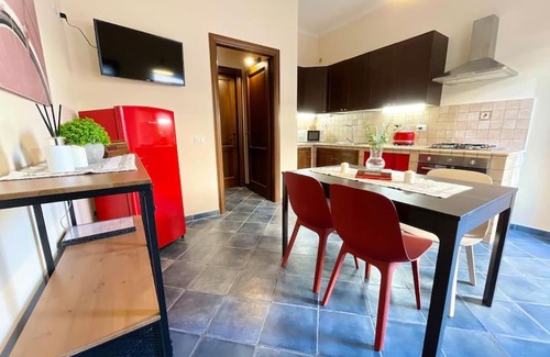 Fiumicino Apartment | [airport suite]overlooking old town and riverfront