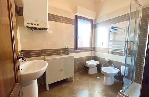 Fiumicino Apartment | [airport suite]overlooking old town and riverfront