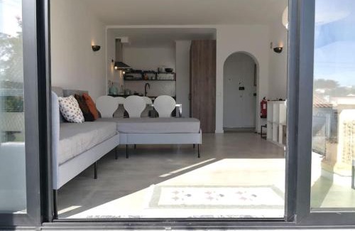 Areias de Sao Joao Apartment | Airy 3br, AC, Garden, 2min Strip, 8min Oura Beach