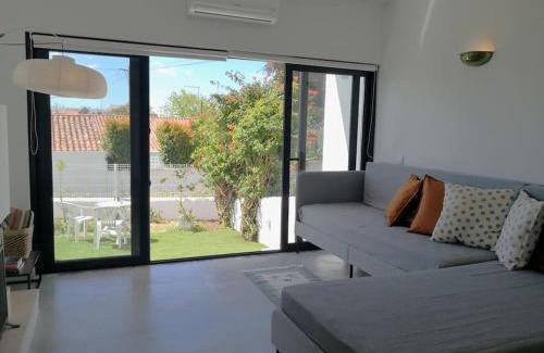 Areias de Sao Joao Apartment | Airy 3br, AC, Garden, 2min Strip, 8min Oura Beach
