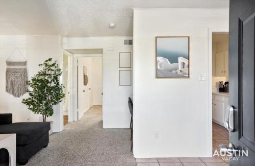Hancock Apartment | Airy King Bedroom and Comfortable Living Space by UT