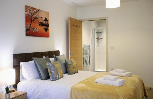 Brent Apartment | Aisiki Stays Apartments at Queensbury, Ground Floor, 2-Bedroom & 2-Bathroom, King or Twin Beds with Front Porch, with Free Wi-Fi & Parking Space