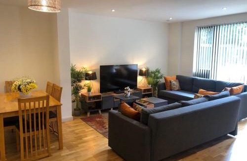 Brent Apartment | Aisiki Stays Apartments at Queensbury, Ground Floor, 2-Bedroom & 2-Bathroom, King or Twin Beds with Front Porch, with Free Wi-Fi & Parking Space