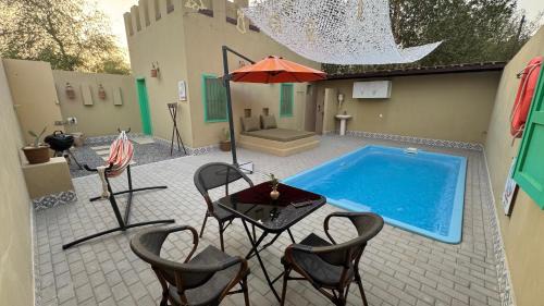 Ras Al Khaimah House | Al Bait resort with private swimming pools -HRS stables