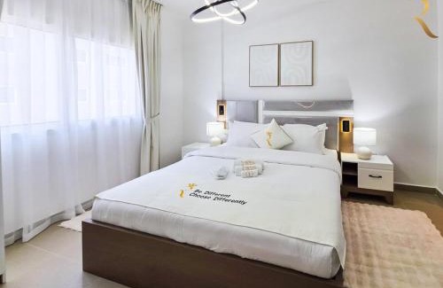 Abu Dhabi Apartment | Al Reef Grace 1BR - Stylish Stay with Balcony, Dining & Kitchen Near Al Reef Beac