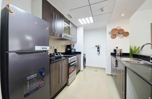 Abu Dhabi Apartment | Al Reef Grace 1BR - Stylish Stay with Balcony, Dining & Kitchen Near Al Reef Beac