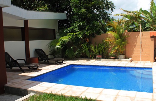 San Salvador House | All Days Inn and Out