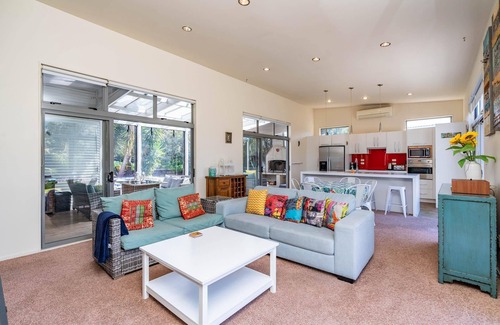 Mangawhai Heads House | All Decked Out - Modern holiday home with great covered outdoor entertaining space in handy location