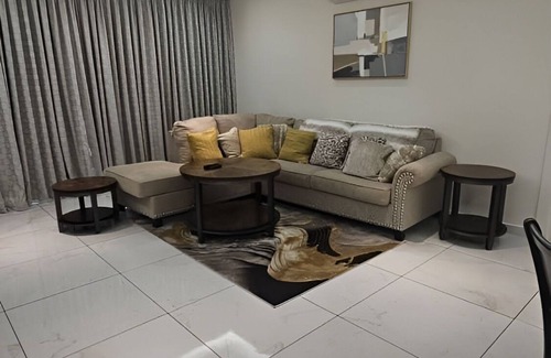 Kumasi Apartment | Alveera Apartments, Spacious 4-bedroom in charming Kumasi with WiFi, AC