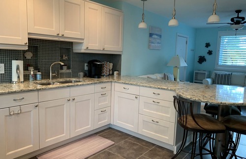 St. Pete Beach Condo | Amazing beach condo with coastal vibes - beachside/poolside - 2 BR/Ground floor!