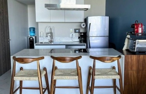 Flamingos Apartment | Amazing Jewel Beach front Condo with great views