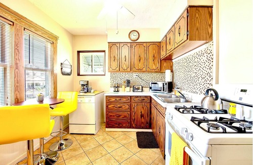 Cleveland House | Amber Hearth: Bright Family 3BR Upper Home | Laundry, Porch & Parking Garage 6 Min to Downtown