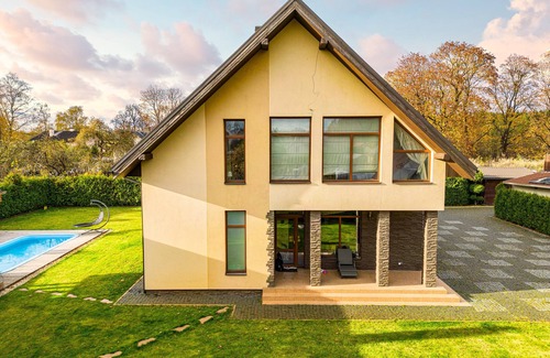 Latgale Suburb Villa | AmberVilla In a quiet place, next to the forest,near city center.Sauna with pool