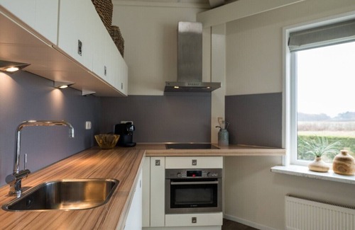 Hollum House | Amie a nice holiday home near the golf course, the village of Hollum and nature.