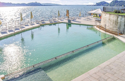 Meina Apartment | Antique palazzo from the 17th century, located on the lake and with private beach and common pool.