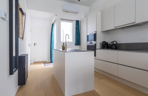 Amandus - Atheneum Apartment | Antwerp Gem: Stylish Apartment Near Trendy Eiland