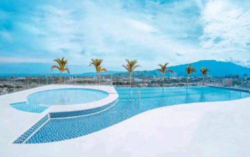 Ibague Apartment | Apartaestudio cerca centros comerciales -Refugio romantico