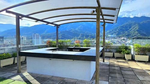 Ibague Apartment | Apartaestudio cerca centros comerciales -Refugio romantico
