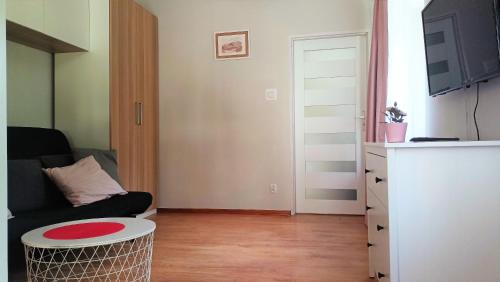Srodmiescie Apartment | Apartament Malinowy Świętoduska 12