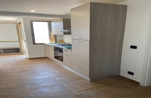 Giardini Naxos Apartment | Apartament z widokiem na morze 20 m od plaży w Giardini Naxos na Sycylii.