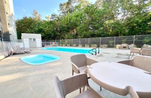 Vila Industrial Apartment | Apartamento Inteiro - 2 Quartos com AC - Wifi 1000mb - Piscina - 1 Vaga de Garagem - Elevador - Sacada Gourmet - Indicado para Grupos, Hospedes a Trabalho, Família e Pets