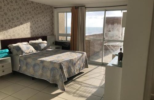 Porto das Dunas Apartment | Apartamento Vista total do Mar uma cobertura a 400m do Beach Park no Porto das Dunas Aquiraz Condomínio Terramaris Piscina ampla Parque infantil Sauna Estacionamento privado