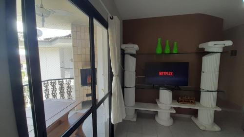 Toninhas Apartment | Apartamento Wembley Tenis - H402