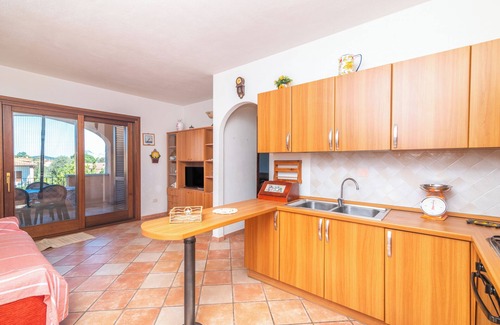 San Teodoro City Centre Apartment | Apartment 'Appartamento I Lecci' with Private Terrace and Balcony