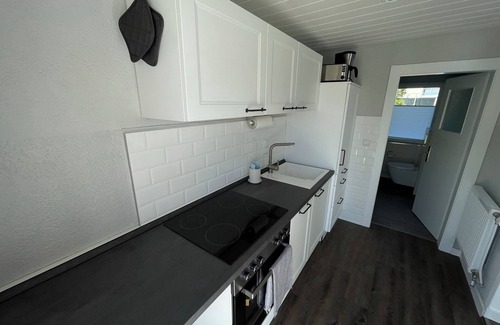 Schaprode Apartment | Apartment 'Boddenferienhaus - 11 Seemannsgarn' with Shared Terrace, Shared Garden and Wi-Fi