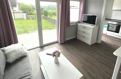 Schaprode Apartment | Apartment 'Boddenferienhaus - 12 Molenfeuer' with Shared Terrace, Shared Garden and Wi-Fi