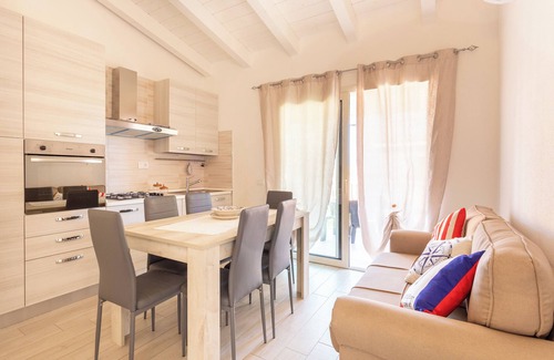 Trinita d'Agultu e Vignola Apartment | Apartment 'Casa Macis Vista Mare' with Sea View, Private Terrace and Air Conditioning