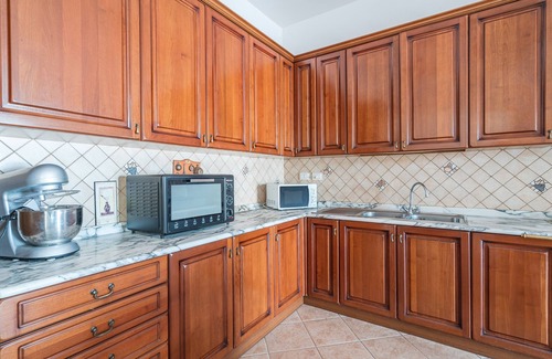 Punta Milocca Apartment | Apartment 'Casa Vivaldi Vista Giardino' with Sea View, Wi-Fi and Air Conditioning