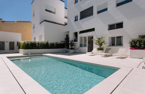 L'Alfas del Pi Apartment | Apartment 'Duplex B-02' with Shared Pool, Wi-Fi and Air Conditioning