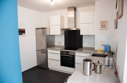 Eppendorf Apartment | Apartment Eppendorf balcony with Mid Century furniture near UKE central location