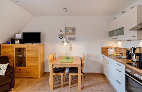 Norddeich Apartment | Apartment 'Ferienwohnung Neue Sande' with Private Garden, Balcony and Wi-Fi