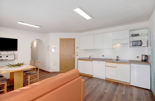 Tesero Apartment | Apartment "Foresto Superior" with Mountain View, Pool, Sauna & Garden