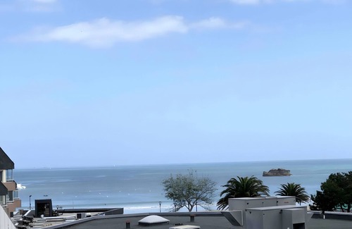 Perros-Guirec Apartment | Apartment 'Hortensia By Madame Est Servie' with Sea View, Balcony and Wi-Fi