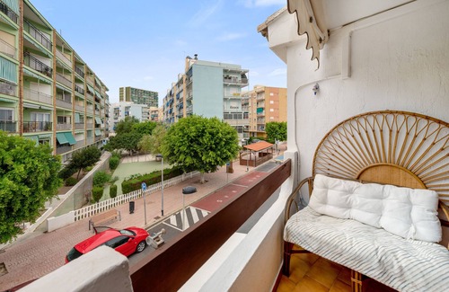 Playa Pobla de Farnals Apartment | Apartment 'Isa Beach ' with Shared Pool, Wi-Fi and Air Conditioning