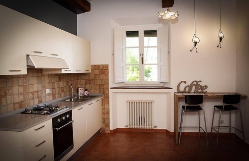 SantʼAndrea di Compito Apartment | Apartment in an old renovated mill with terrace